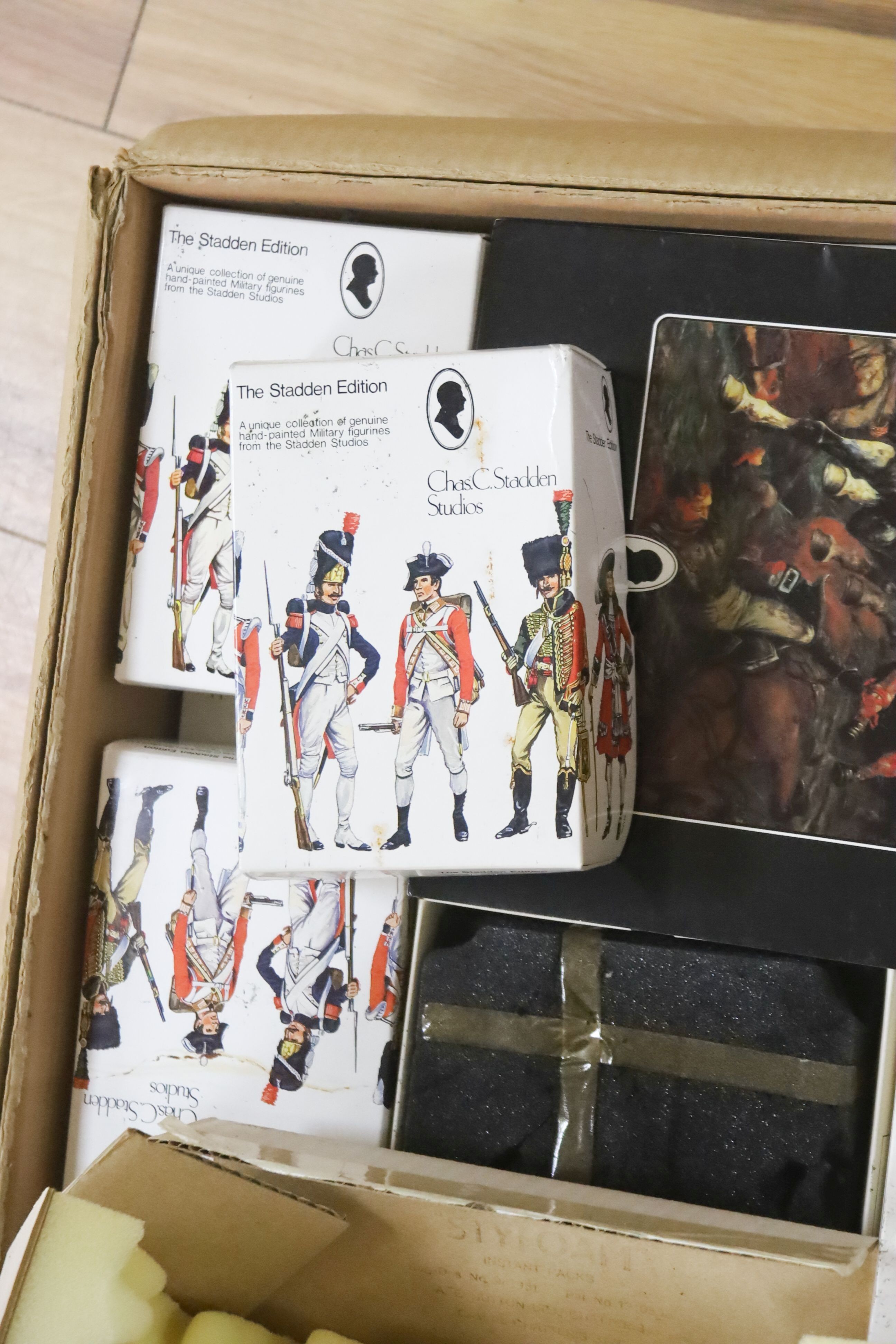 A collection of model soldiers by Charles Stadden, many boxed